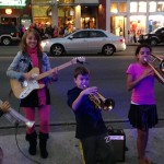 Very talented kids drawing a huge crowd on the street corner.